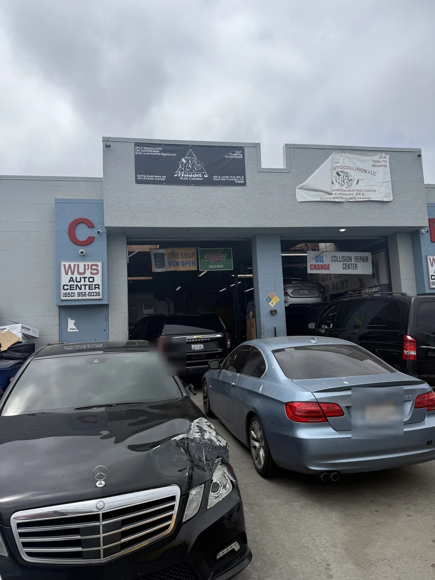 Wu's Auto Center repair bays and forecourt on South Linden Ave