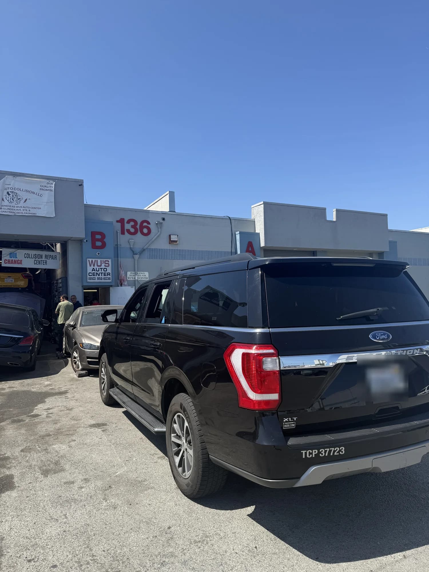 Ford Explorer parked outside bay B