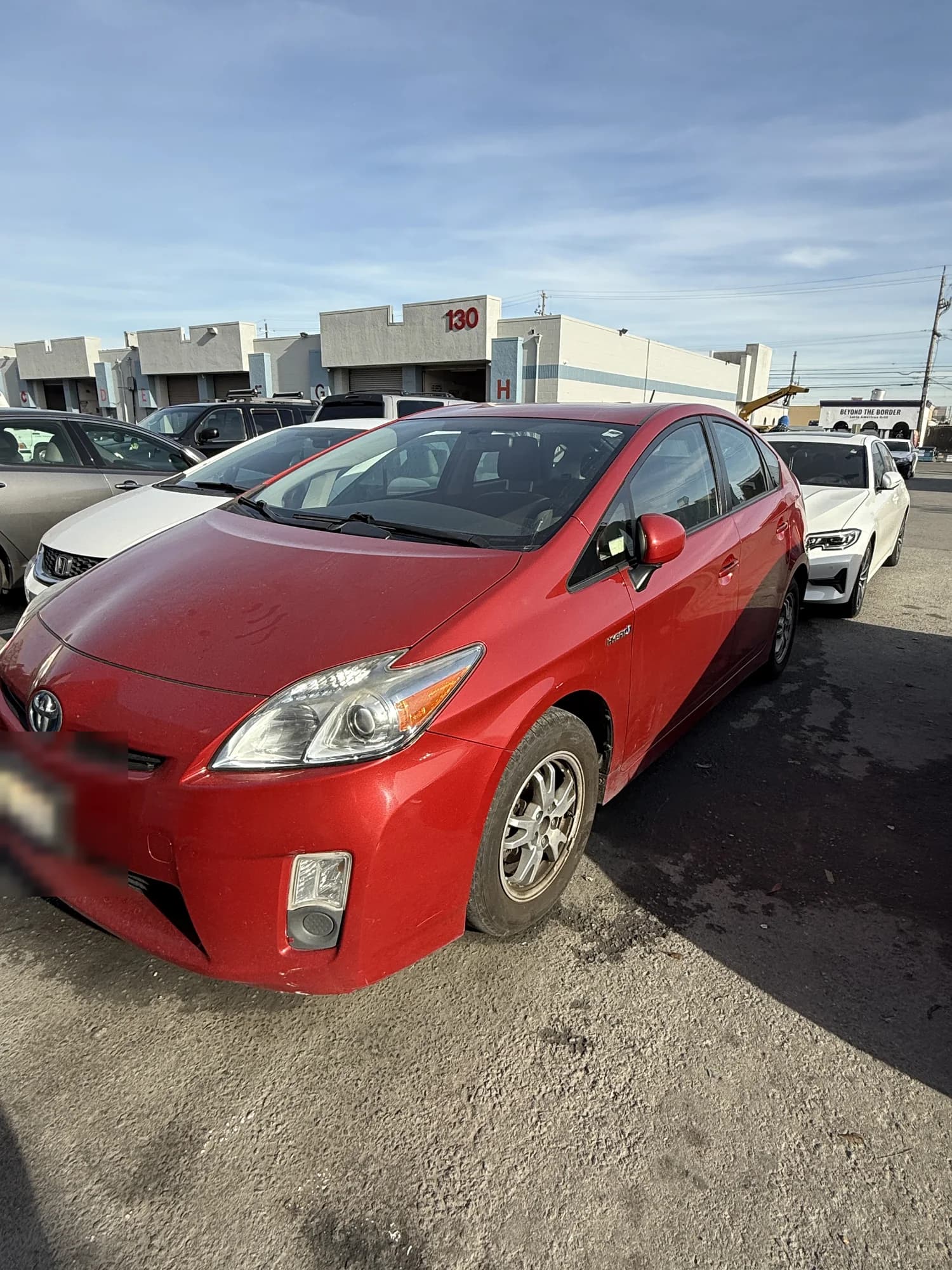 Toyota Prius parked at the shop